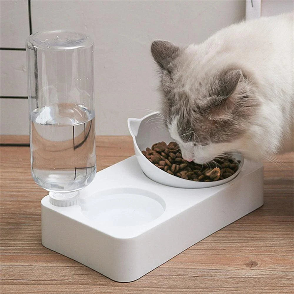 A sleek and rounded cat food and water bowl with an integrated water dispenser, made from high-quality plastic and designed for convenience and style.