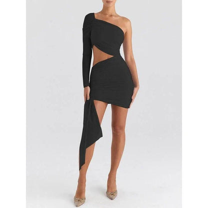 Elegant backless mini dress with sheer mesh overlay, perfect for spring and summer events in the UK