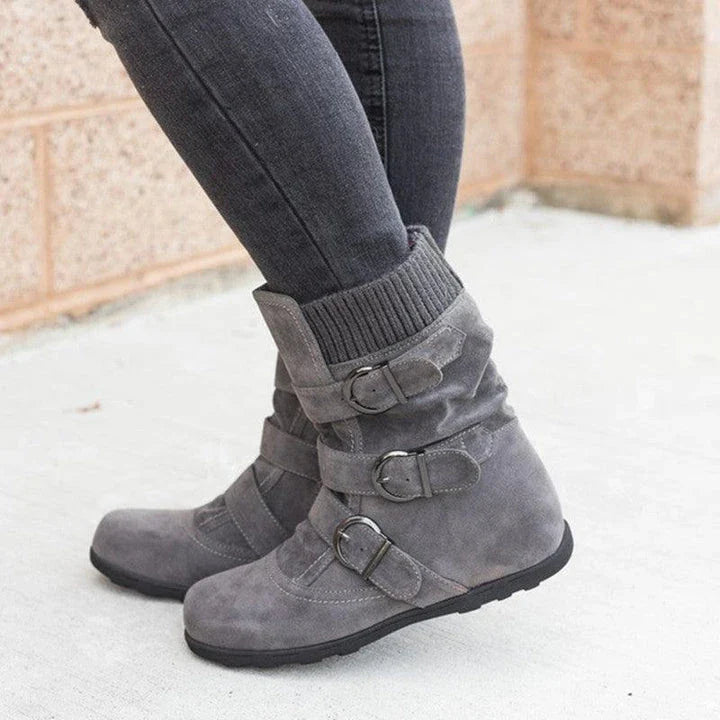 Durable cotton boots with resilient rubber soles, stylish car-stitch detailing, and cushioned artificial hair insole for all-day comfort.