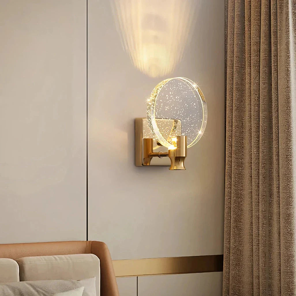 Elegant crystal LED wall lamp with copper body and glass shade, offering warm, cool, and neutral lighting modes for versatile home decor