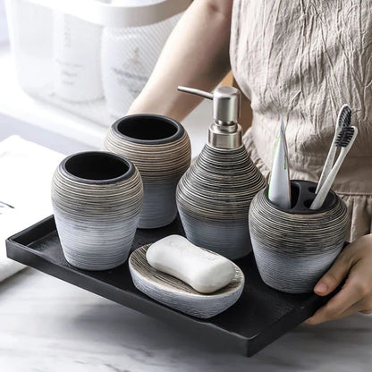 Elegant retro ceramic bathroom accessories set with toothbrush holder, soap dispenser, and mouthwash cup