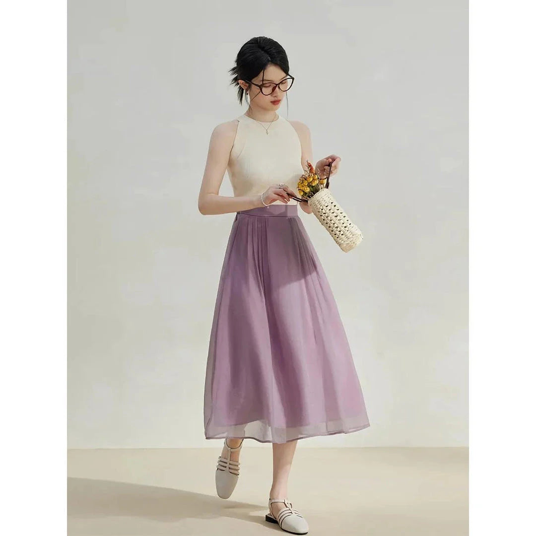 Elegant high-waist a-line midi skirt in a solid, vibrant colour for professional and social wear