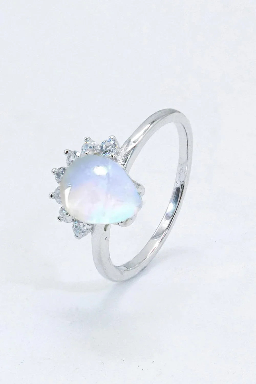 Elegant 925 sterling silver ring featuring a natural moonstone with a captivating blue-violet shimmer