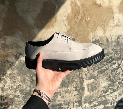 Premium microfiber leather casual shoes with thick rubber sole, low-top design, and striking Korean-inspired details