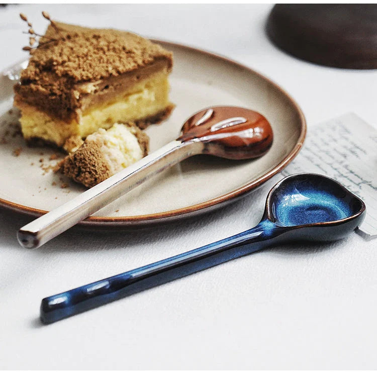 Elegant British ceramic soup spoon with long handle and vibrant glaze for refined dining experience