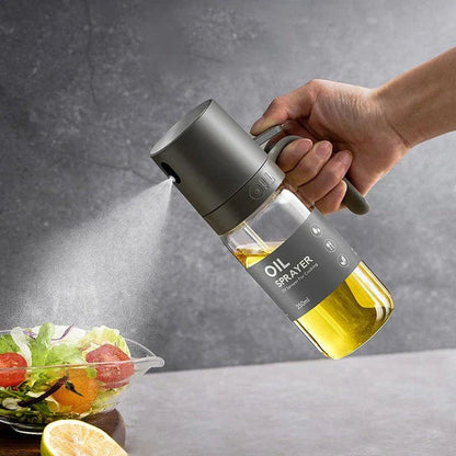 Elegant borosilicate glass oil spray bottle with ergonomic design for hassle-free, healthy cooking