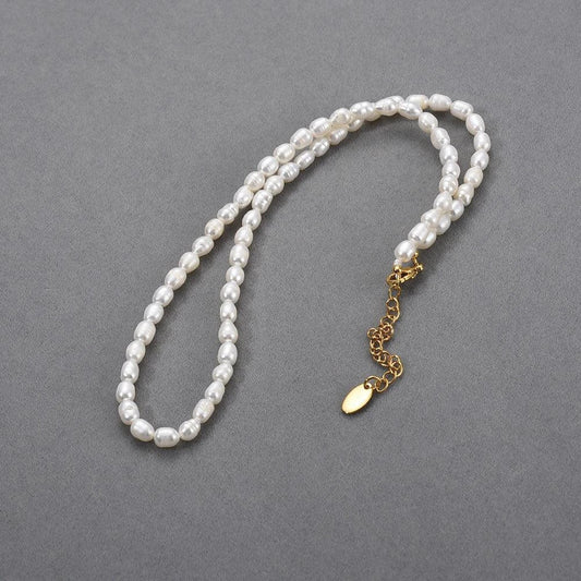 Elegant freshwater pearl necklace with 18K gold-plated copper frame and adjustable chain length