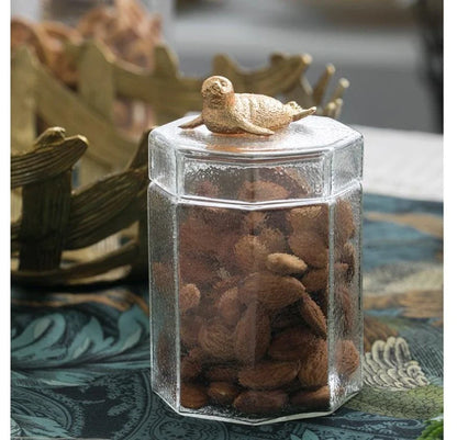 Premium glass food storage jar with a stylish rabbit-shaped lid, ideal for storing dry goods, snacks, and homemade preserves in the kitchen.