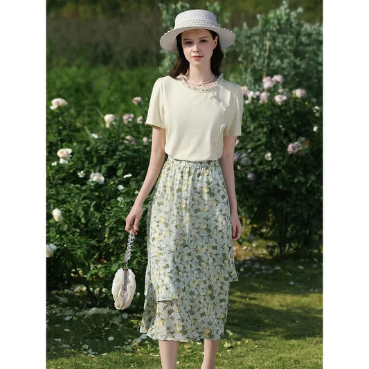 Elegant floral short sleeve t-shirt with wooden ear side detail, perfect for chic British summer style
