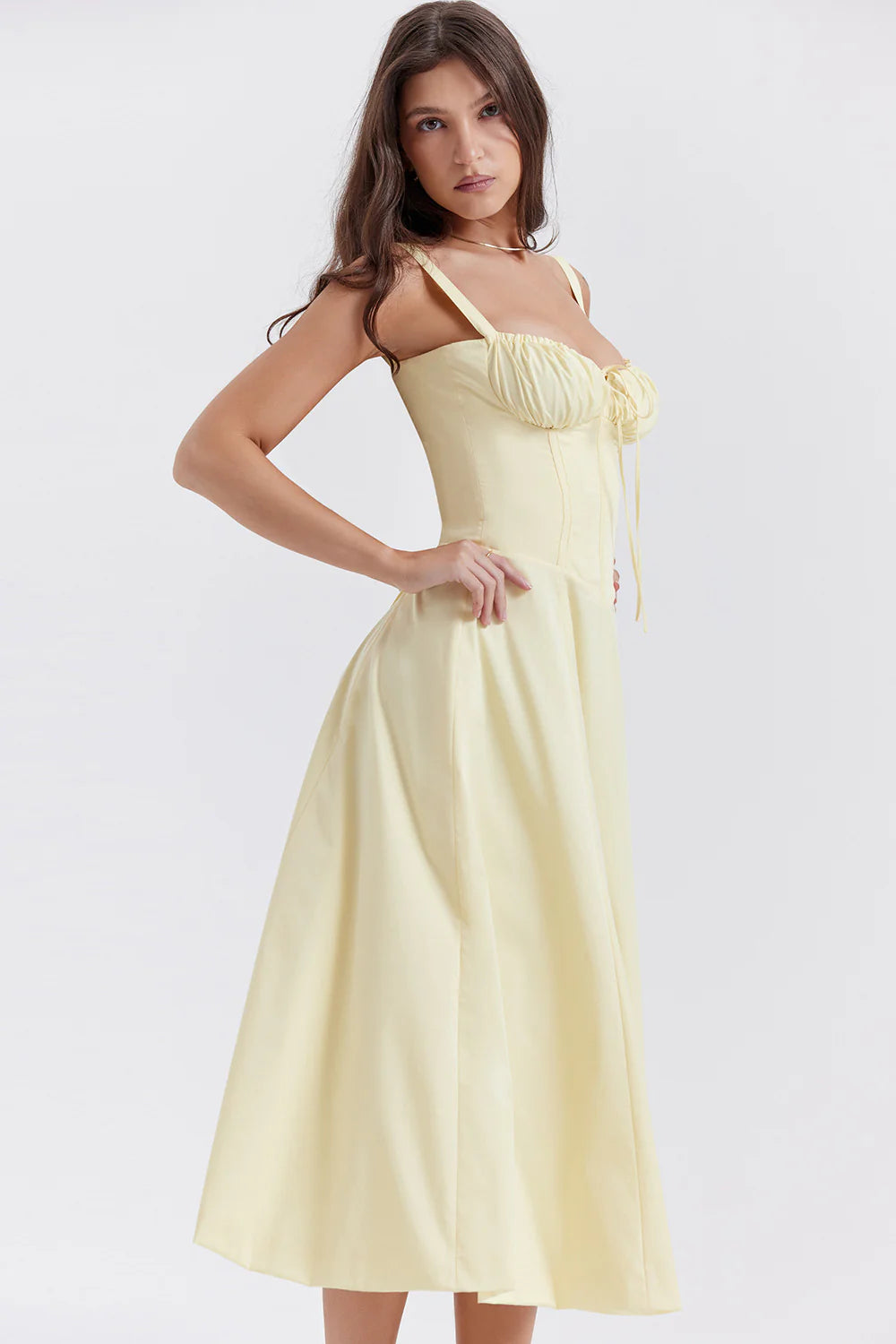 A stylish suspender dress made of premium polyester with a French high-split design, available in a range of vibrant solid colours for versatile summer wear.
