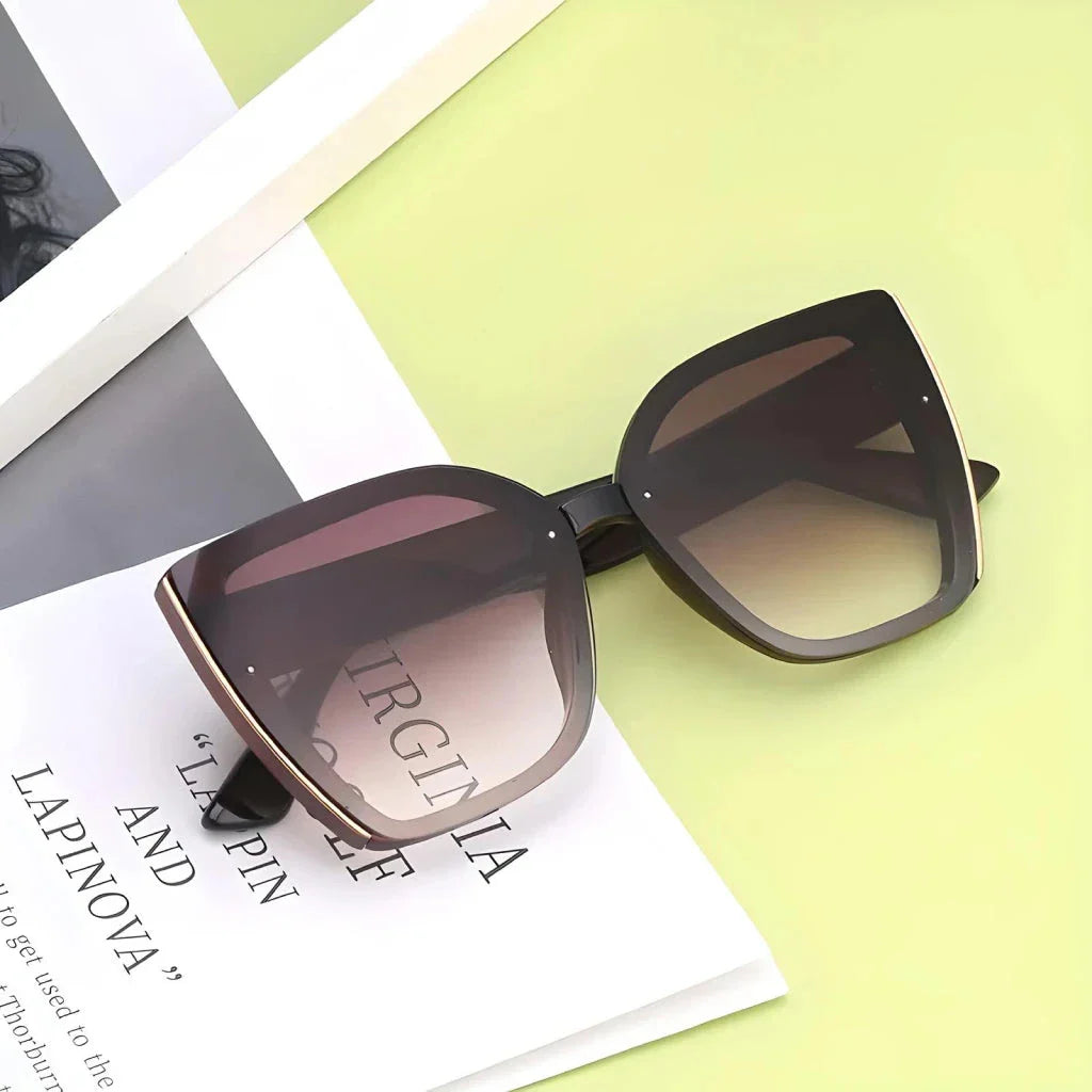 Chic oversized cat eye sunglasses with a vintage-inspired design and UV400 protection for stylish British women
