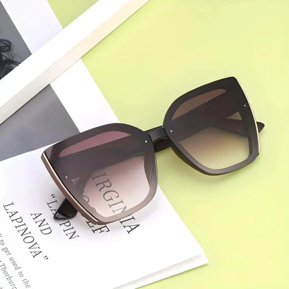Chic oversized cat eye sunglasses with a vintage-inspired design and UV400 protection for stylish British women