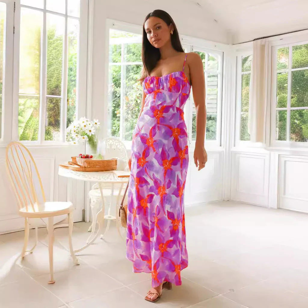 Elegant floral midi dress with backless design, available in yellow, purple, and green colours