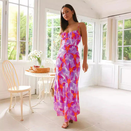 Elegant floral midi dress with backless design, available in yellow, purple, and green colours