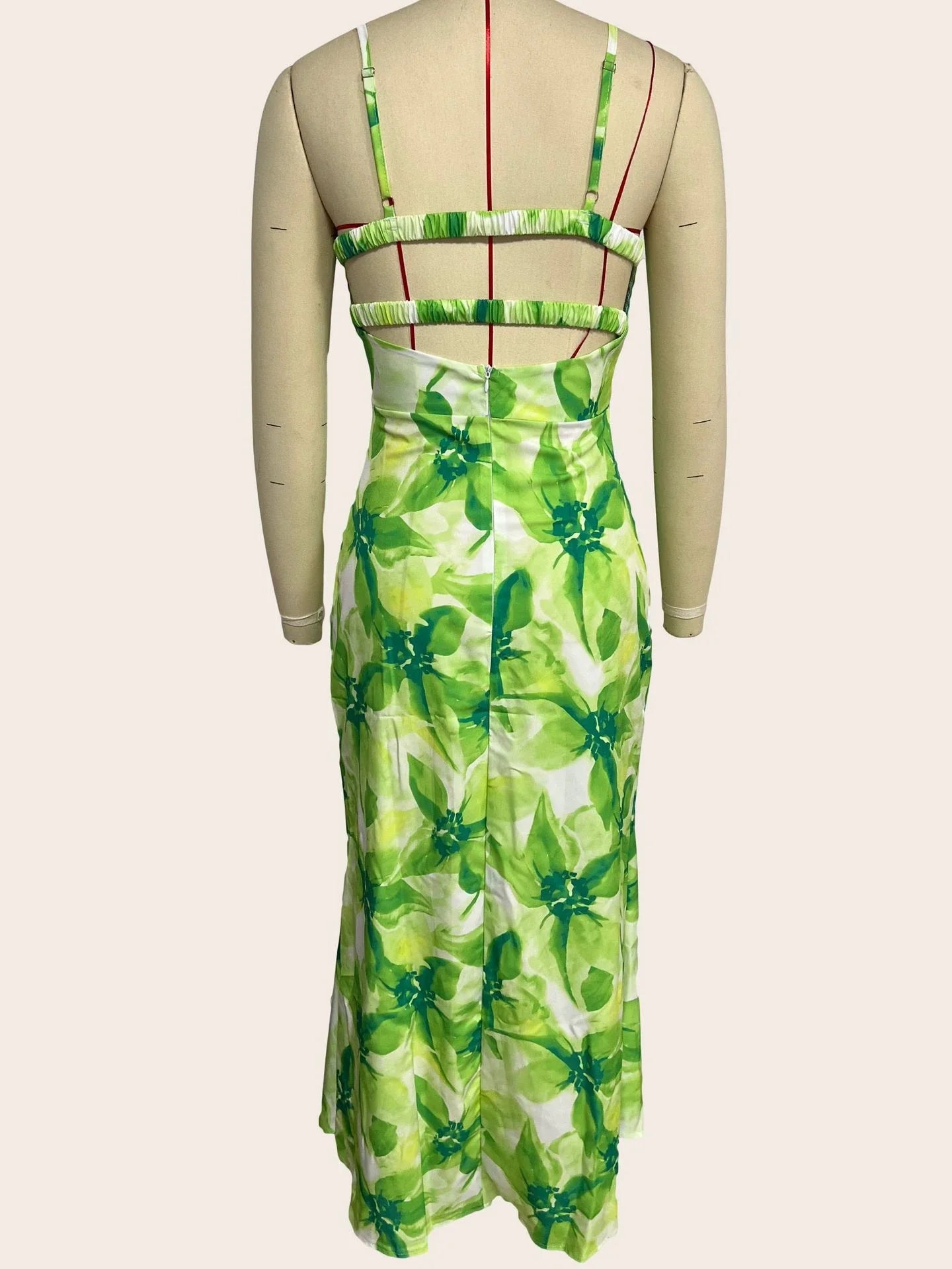 Elegant floral midi dress with backless design, available in yellow, purple, and green colours