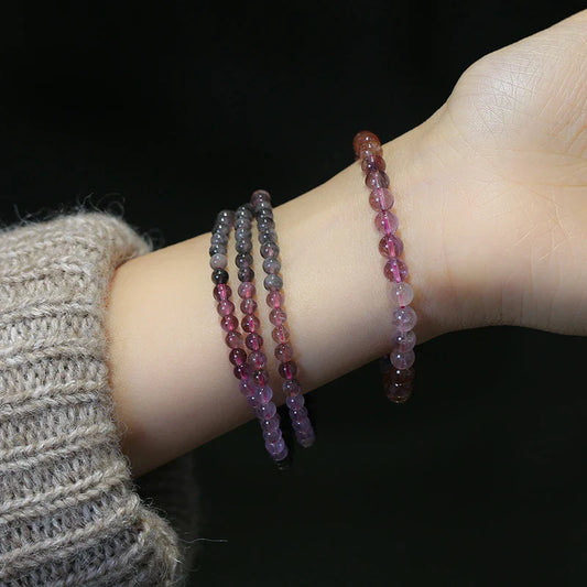 A close-up view of a ladies' fashion bracelet featuring a single loop design with sparkling crystal beads