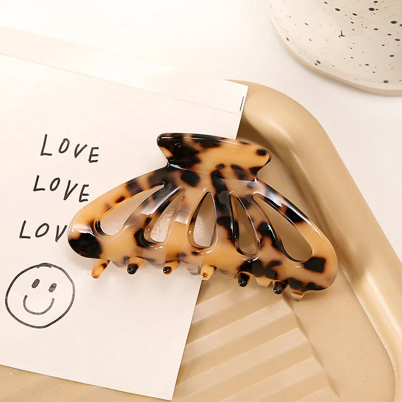 Chic geometric hollow stripes hair barrettes made from premium acetate for women's fashion and hairstyles