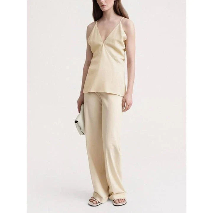 Elegant summer camisole with v-neck and backless design, made from soft viscose fabric for comfort and style