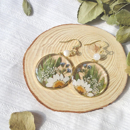 Elegant natural floral earrings with dried flowers and copper gilding, embodying British style and sophistication