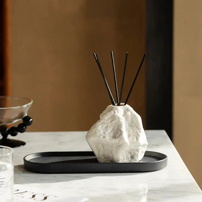 Elegant Nordic-style ceramic aromatherapy diffuser bottle with a modern, rock-inspired design