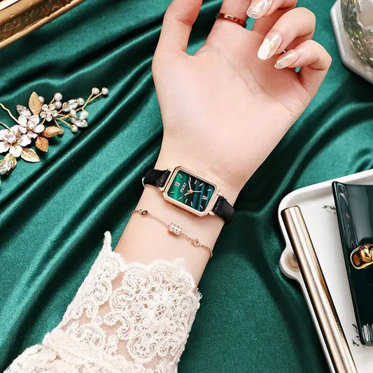 Elegant square dial women's watch with premium red leather strap, showcasing a unique and minimalist design