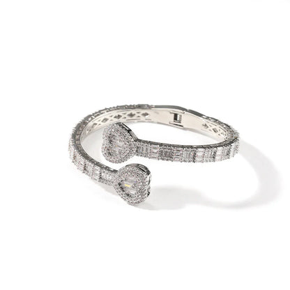 Elegant geometric bracelet with diamond accents in gold, silver, and rose gold finishes