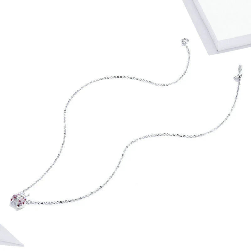 Delicate 925 sterling silver necklace featuring a charming ladybug design, with an adjustable 45cm chain for a customised fit.