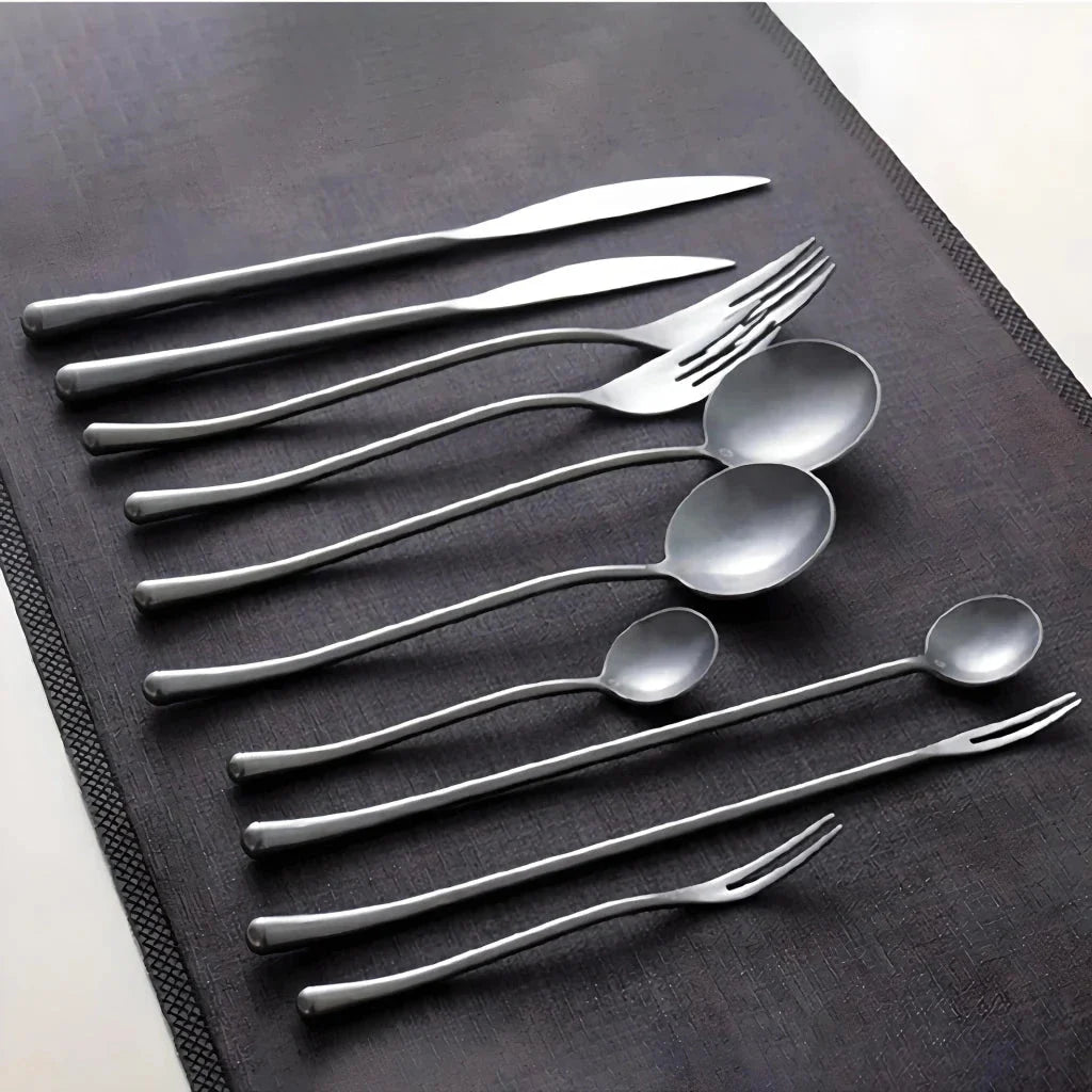 Elegant retro stainless steel cutlery set with sleek silver finish and solid pattern for sophisticated British dining