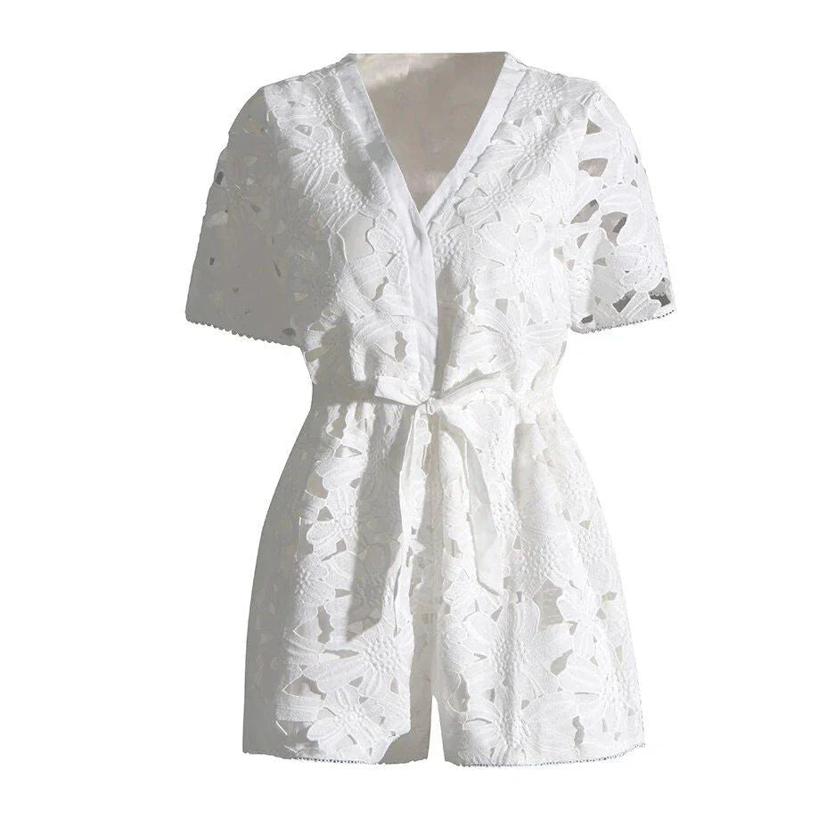 Elegant embroidered playsuit with hollow-out details, perfect for British summer style