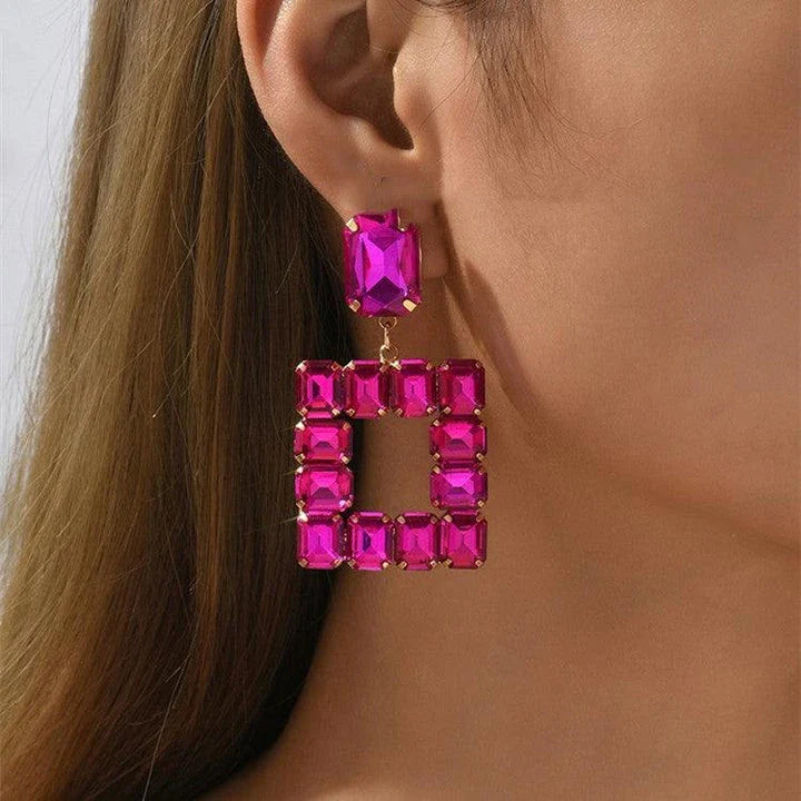 Pair of enchanting crystal earrings made with premium artificial crystals in various colours including rose red, green, pink, champagne, and black