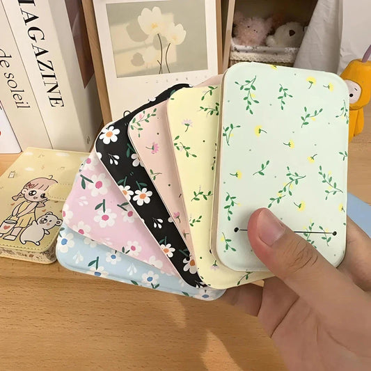 Elegant floral folding makeup mirror with a unique design and clear, distortion-free reflection