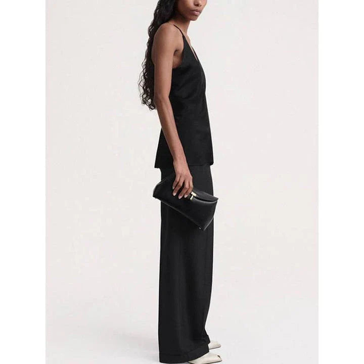Elegant summer camisole with v-neck and backless design, made from soft viscose fabric for comfort and style