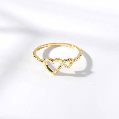 Elegant heart-shaped love ring in stainless steel and copper, a timeless and versatile piece of bridal jewellery