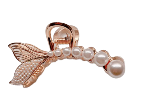 Elegant gold-toned mermaid tail hair clips with faux pearls, a unique and enchanting accessory for coastal enthusiasts