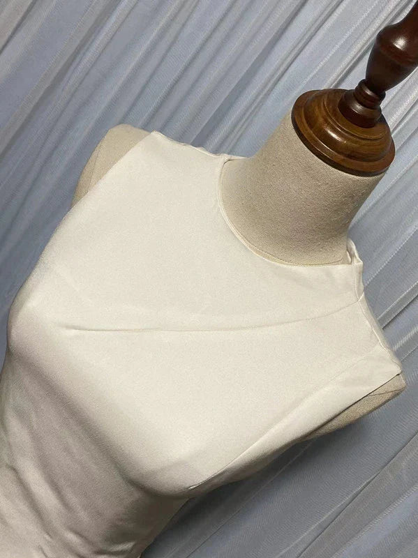 Elegant asymmetric dress in wine red and milky white with a half turtleneck design, perfect for autumn and winter wear.