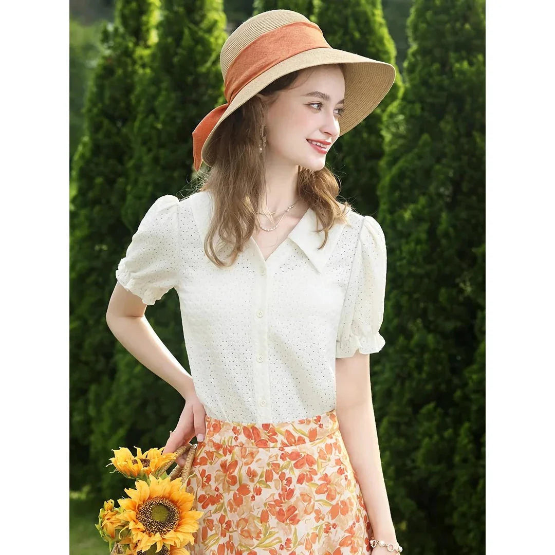 Elegant apricot French-inspired lace blouse with puff sleeves and v-neck collar, perfect for the modern British woman