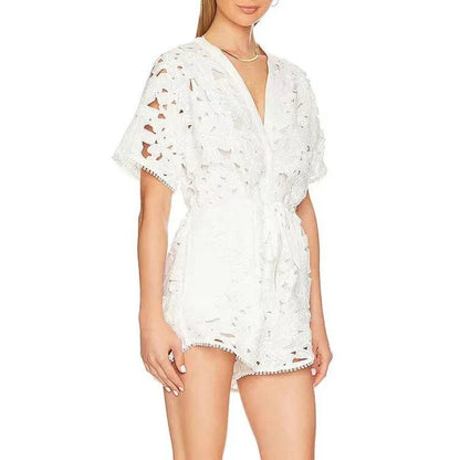 Elegant embroidered playsuit with hollow-out details, perfect for British summer style