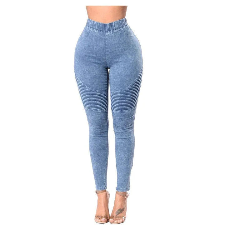 Flattering high-waisted denim jeans with a unique crinkled finish and lift-and-tuck technology for a sculpted, confident rear