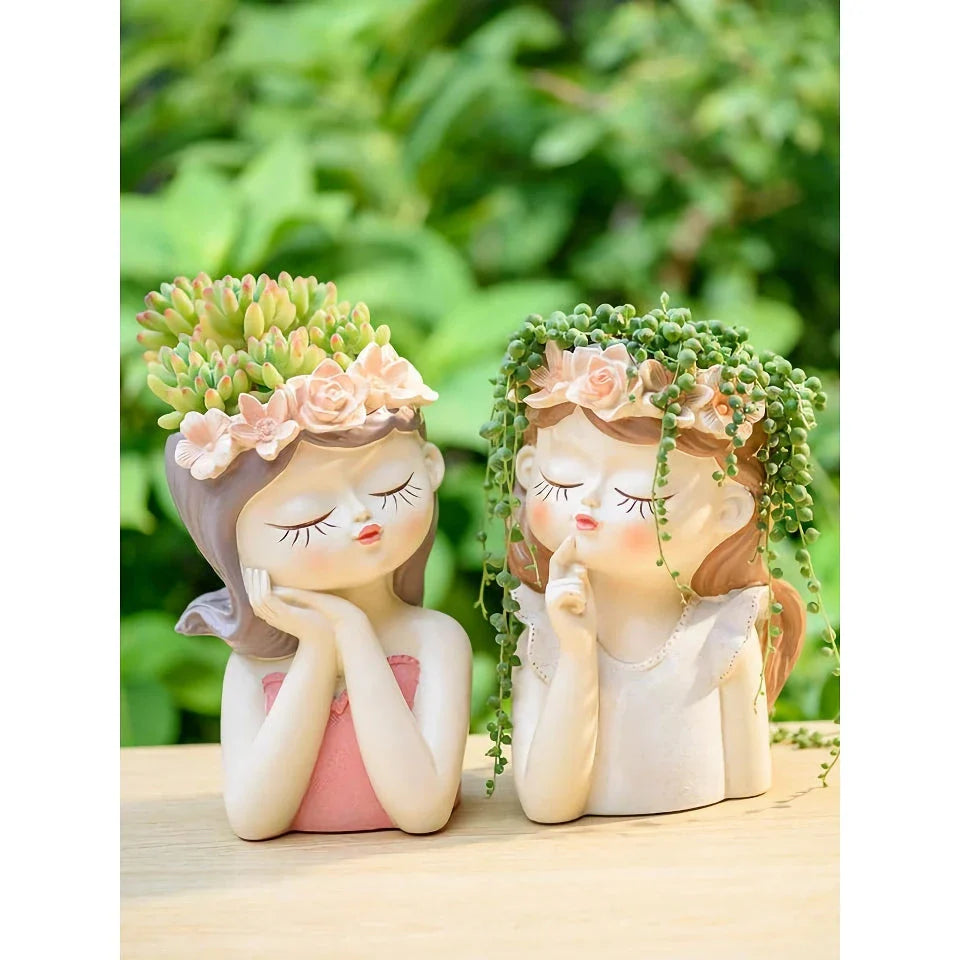 A charming 7.8-inch resin planter in the shape of a fairy girl, perfect for displaying succulents and adding whimsical decor to your home or office.