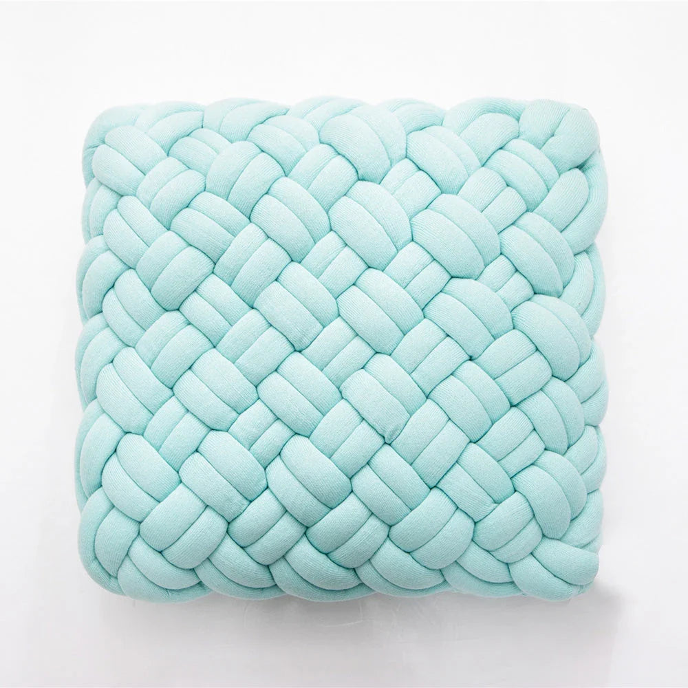 Handmade cotton throw pillow with unique knotted design in a sky blue colour