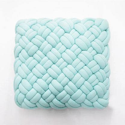 Handmade cotton throw pillow with unique knotted design in a sky blue colour