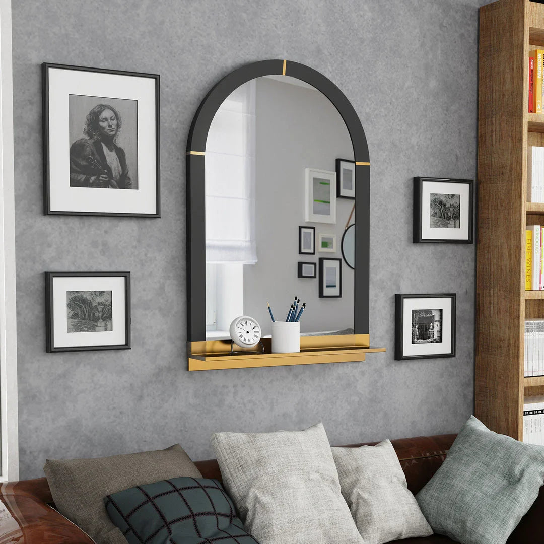 Elegant arched black and gold wall mirror with decorative shelf for home decor