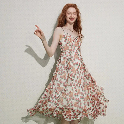 Elegant French-inspired midi dress with floral print, V-neck, and spaghetti straps