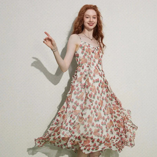 Elegant French-inspired midi dress with floral print, V-neck, and spaghetti straps