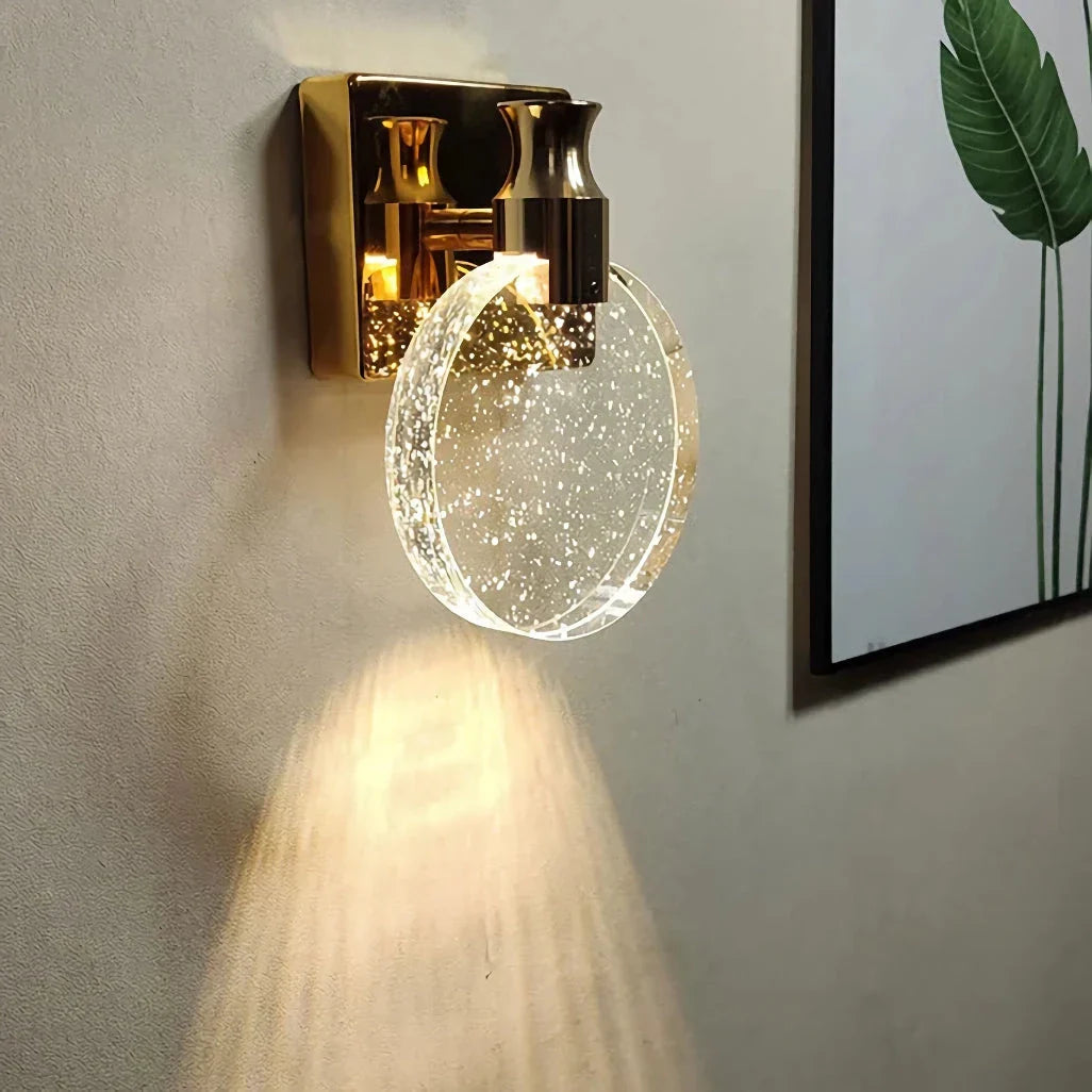 Elegant crystal LED wall lamp with copper body and glass shade, offering warm, cool, and neutral lighting modes for versatile home decor