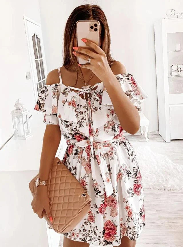 A stylish floral print dress with a flattering waist design, perfect for professional commuting