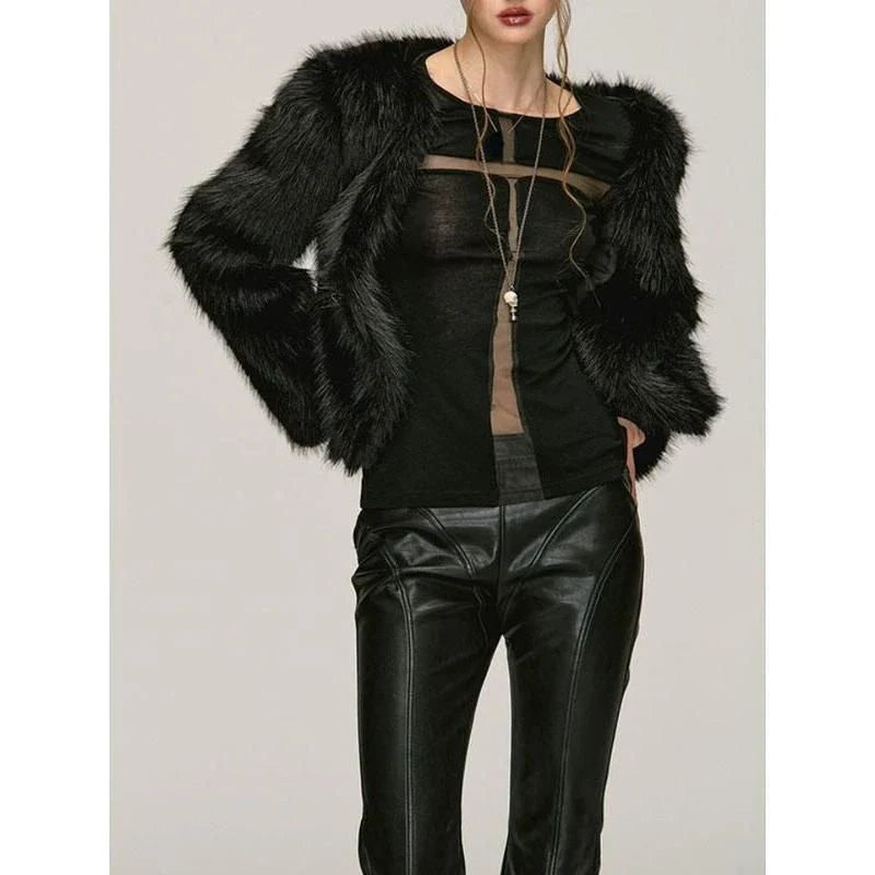 A stylish Gothic Cross Gauze T-Shirt featuring a subtle yet bold cross design and a see-through gauze patchwork for a captivating, edgy look.