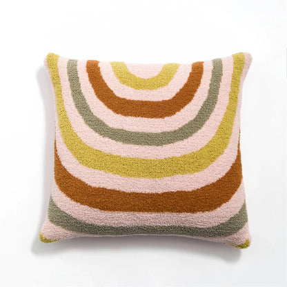 Bohemian-inspired microfibre cushion cover in light pink and white with a cosy, fuzzy texture