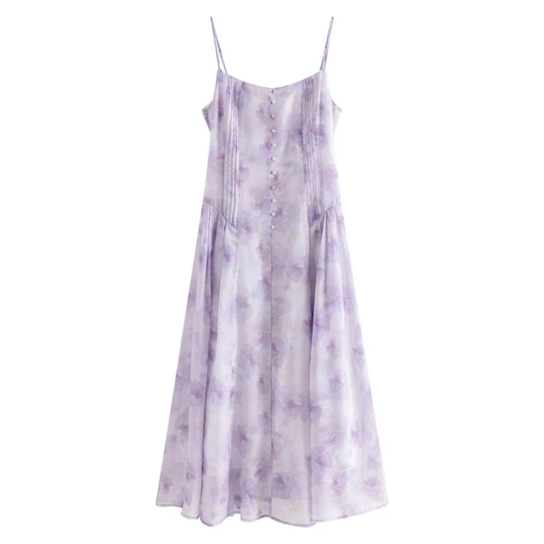 Elegant floral sleeveless summer dress in orange with a flattering A-line silhouette, perfect for British summer occasions.