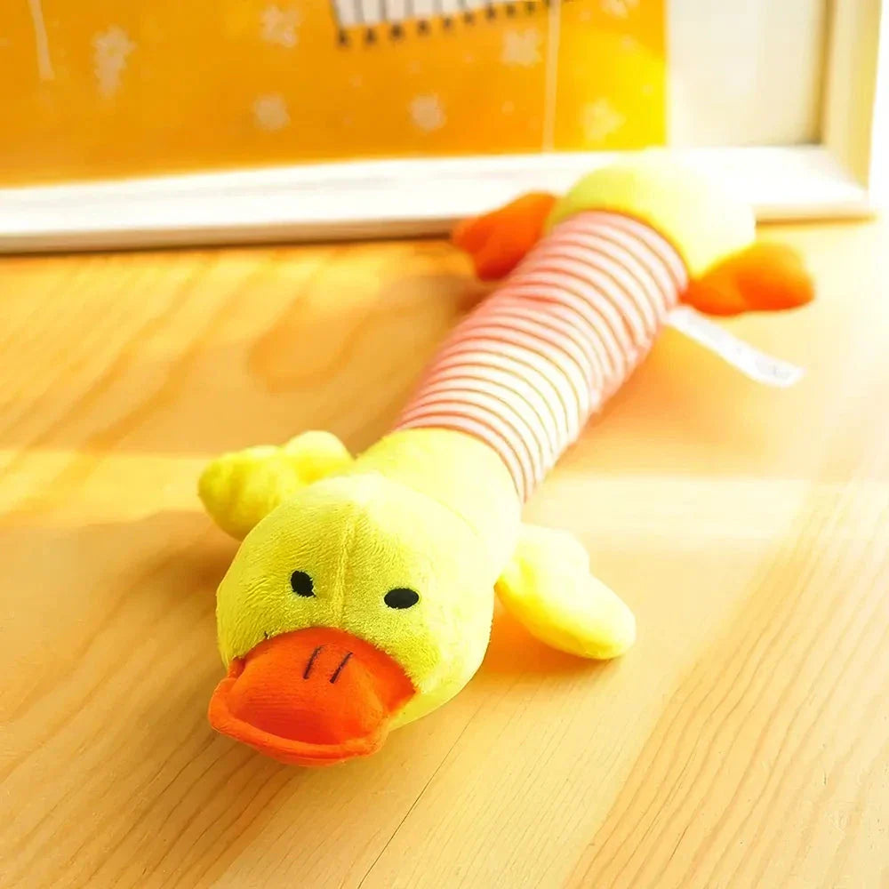 Adorable plush squeaky toys in various shapes and colours, including Pig, Duck, Elephant, and Chicken Legs, for playful pets